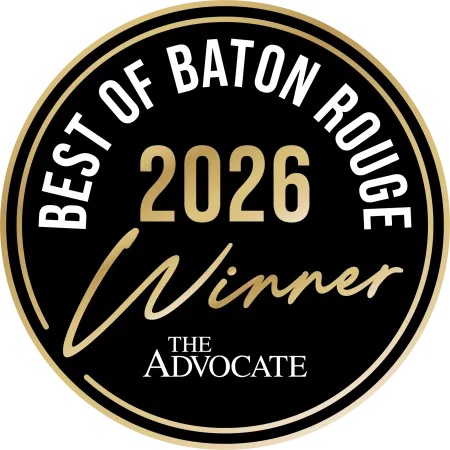 Best of Baton Rouge 2026 Winner badge with The Advocate logo in black and gold colors.