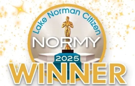 Lake Norman Citizen Normy 2025 Winner badge with a golden statue and sparkling background