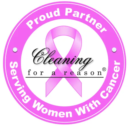 Pink circular logo with breast cancer ribbon and text Cleaning for a Reason, serving women with cancer.