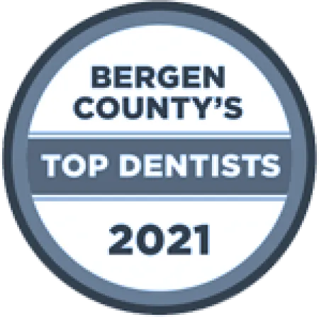Bergen County's Top Dentists 2021 badge in blue and white circular design