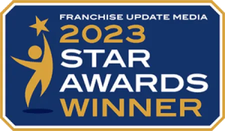 2023 Star Awards Winner badge by Franchise Update Media with gold figure holding star on blue background