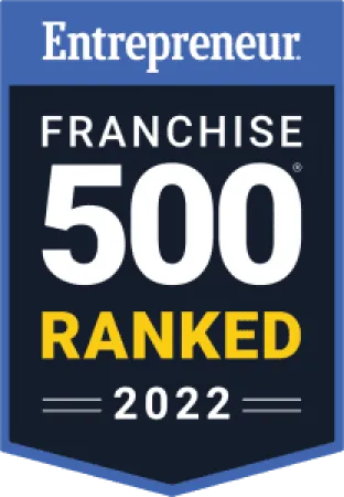 Entrepreneur Franchise 500 Ranked 2022 badge with bold white and yellow text on dark blue background.