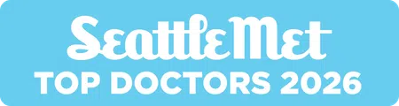 SeattleMet Top Doctors 2026 logo with white text on a light blue rounded rectangle background.