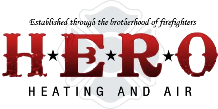 Red HERO text overlaying a faded firefighter emblem with star and shield elements on a transparent background