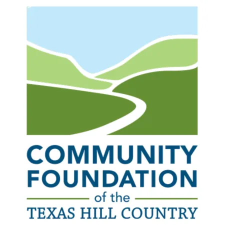 Logo of Community Foundation of the Texas Hill Country with stylized green hills and blue sky.