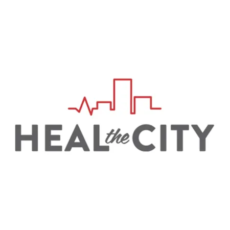 Heal the City logo with a red city skyline and heartbeat line above bold gray text.