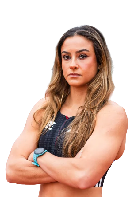 Fit confident woman with long hair in sportswear crossing arms, wearing a smartwatch, isolated on transparent background.