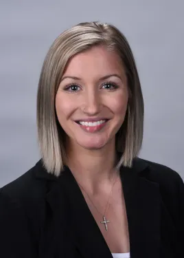 a close-up of a woman smiling