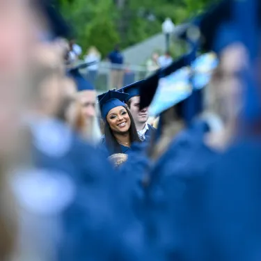 a woman in a graduation cap