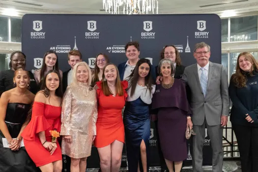a group of people posing for a photo