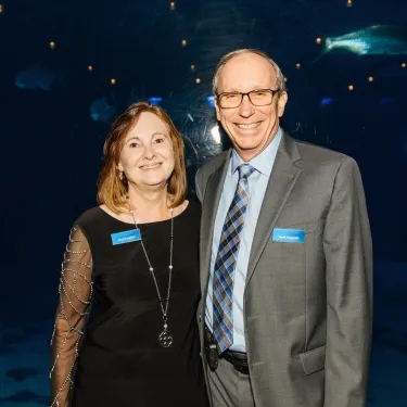 a man and a woman smiling