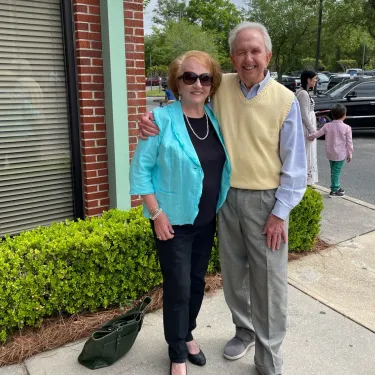 a man and woman posing for a picture