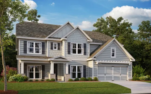 a large house with lots of windows and a light blue exterior