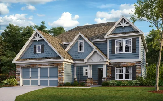 a large house with a blue exterior and many windows
