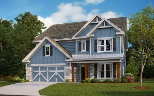 a house with a blue exterior and front yard