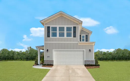 Modern two-story house with a garage, green lawn, and clear blue sky in the background.