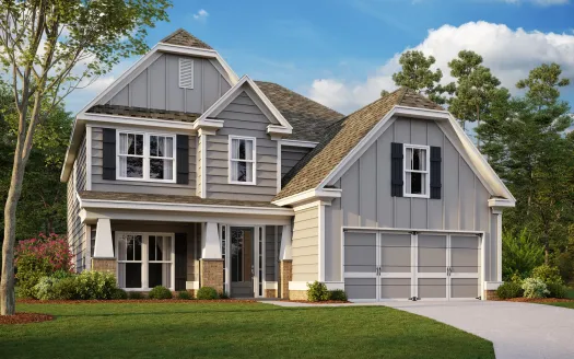 a large home with many windows and a grey exterior