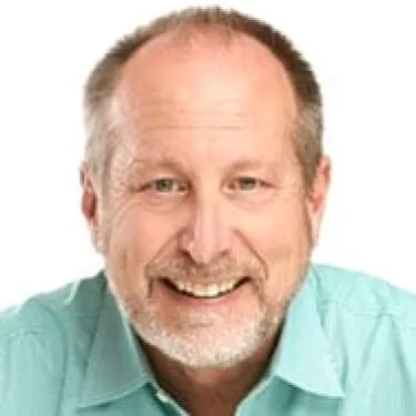 William P. Barnett smiling for the camera