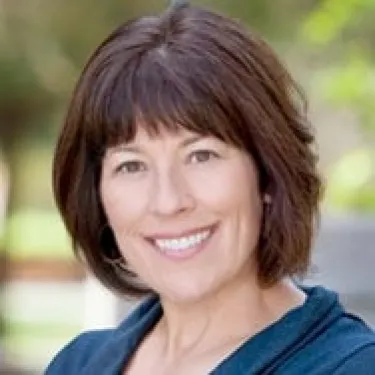 a person smiling for the camera