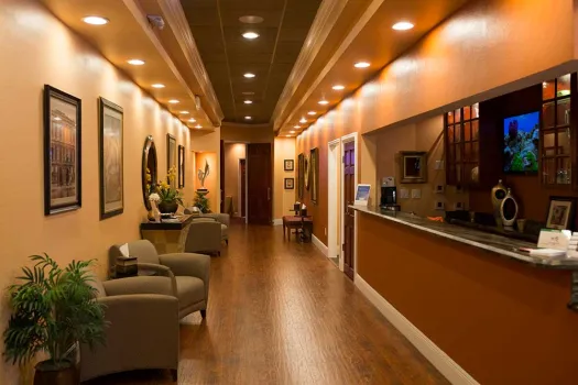 a room filled with furniture and a large window