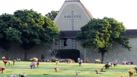 a group of people playing football on a field