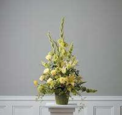a vase of flowers on a tree