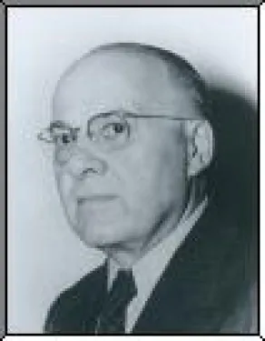 a man wearing glasses and looking at the camera