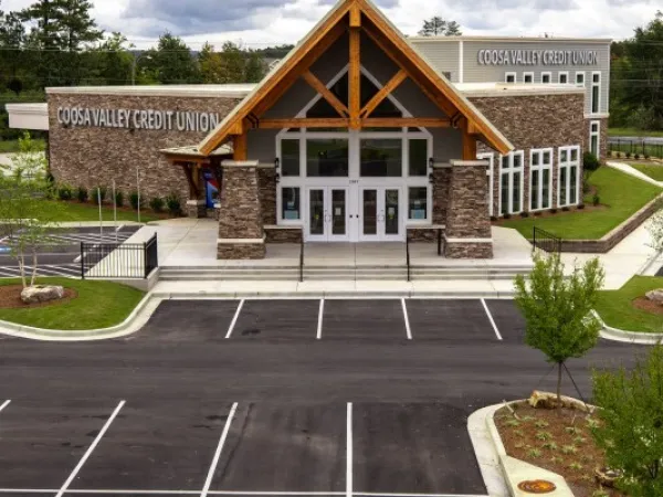 a building with a parking lot
