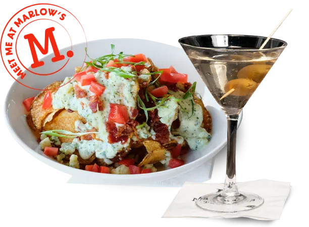 a plate of food and a glass of wine