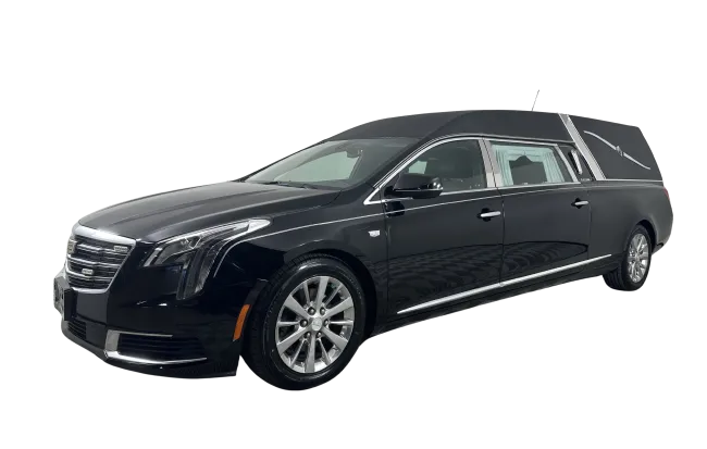 Black luxury stretch funeral hearse with sleek design and modern details isolated on white background