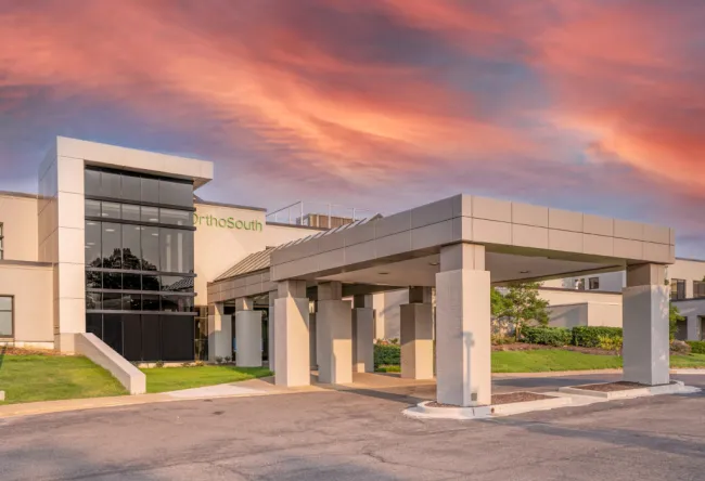 a building with a parking lot
