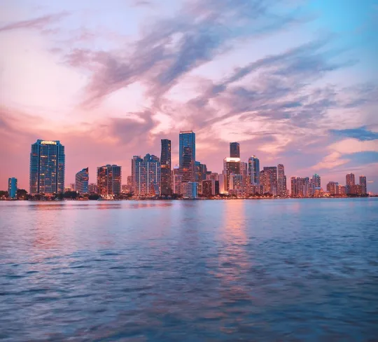 a city skyline across the water