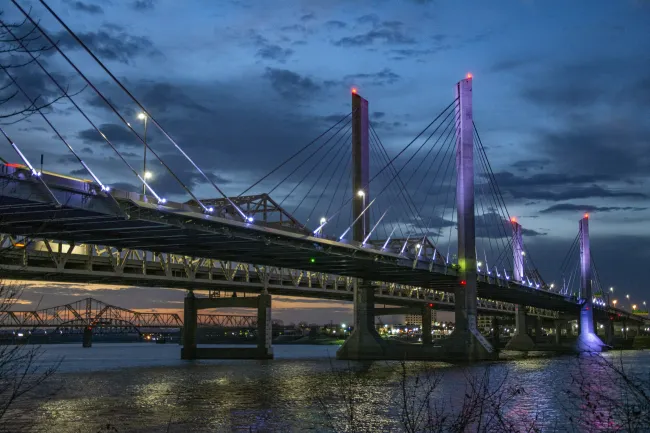 a bridge with lights at night
