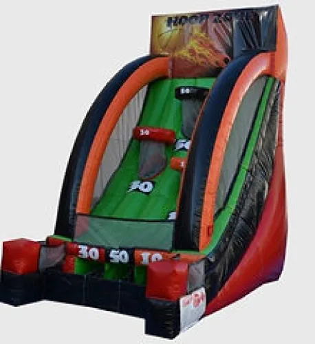 Inflatable basketball hoop game with red, green, and black colors and point targets for shooting practice.