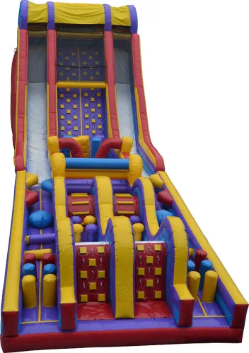 Large colorful inflatable obstacle course and slide with climbing sections in red, yellow, blue, and purple