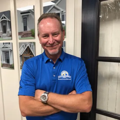 a man in a blue shirt
