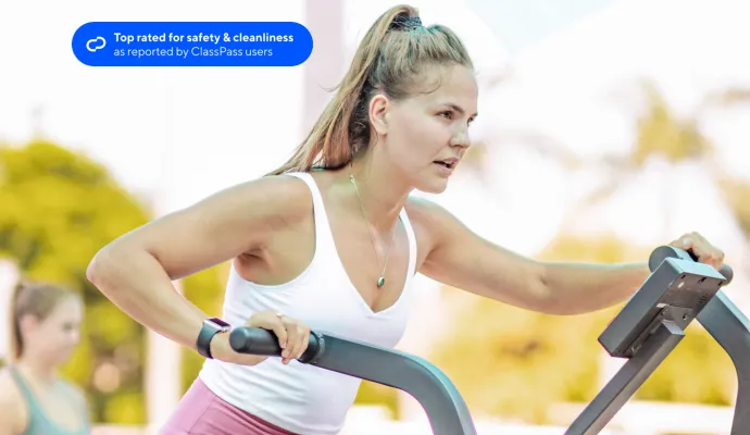 girl working out on an airbike