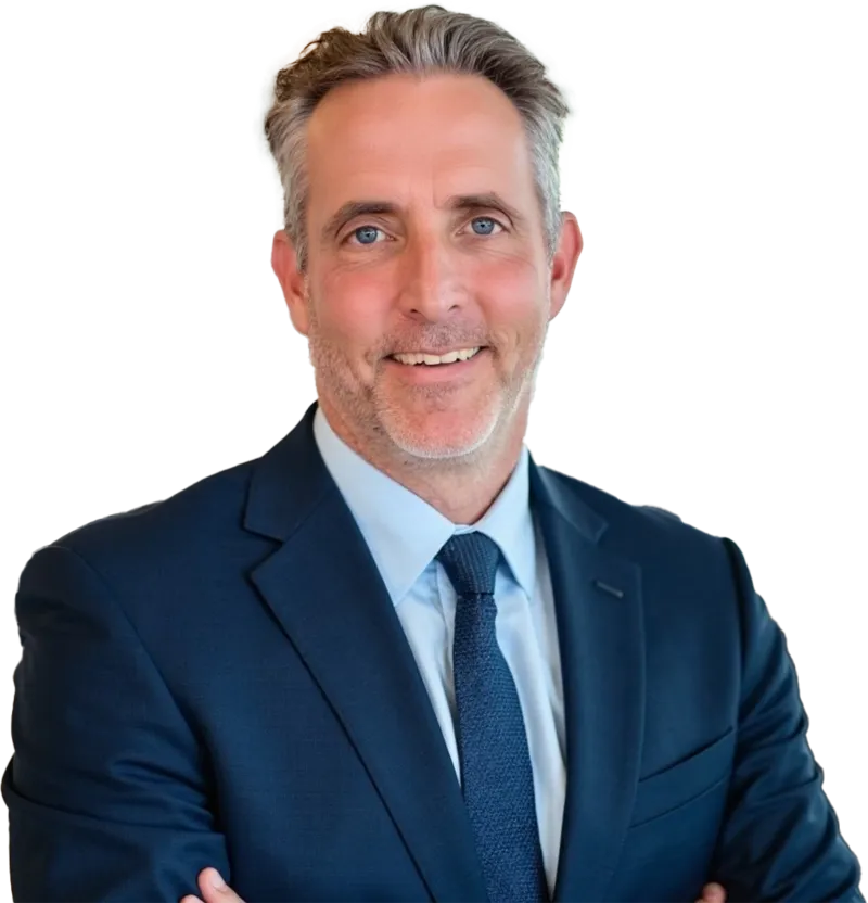 Smiling middle-aged man with gray hair in a blue suit and tie