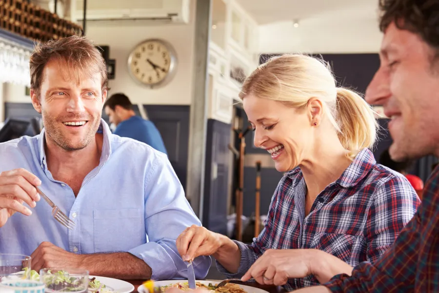 a man and a woman sitting at a table