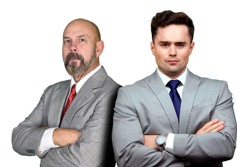 Two confident businessmen in gray suits with crossed arms against black background