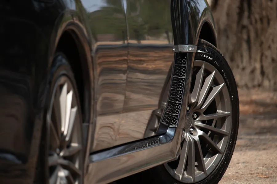 a closeup of nice wheels on a black car