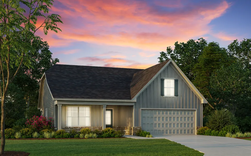 a house with a driveway and trees