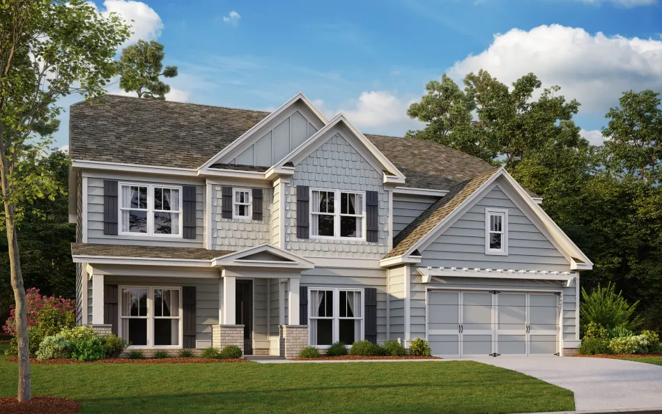 a large house with many windows and a grey exterior
