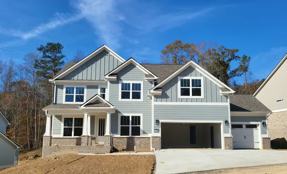 a white house with a garage