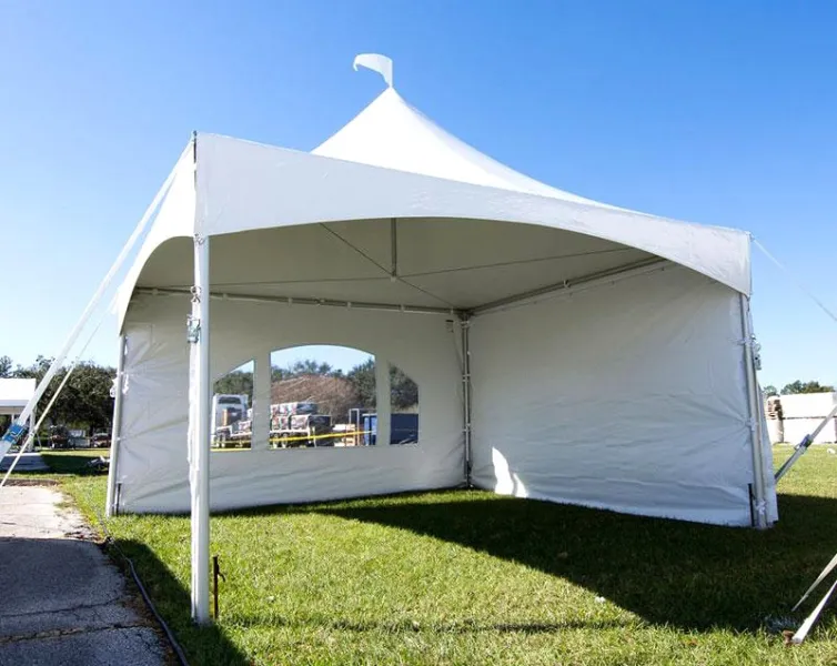 a large lawn in front of a tent