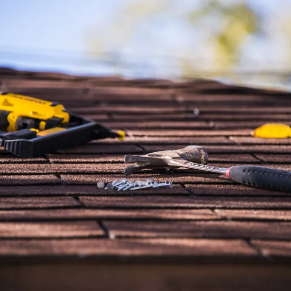 a close up of a hammer on roof