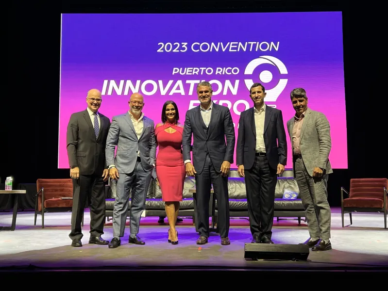 a group of people standing on a stage