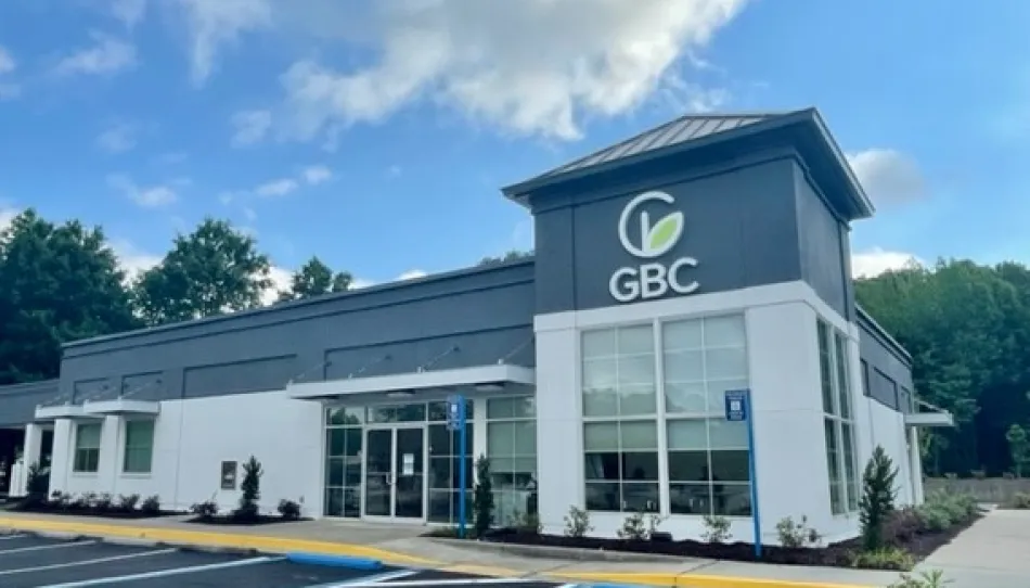 a building with a parking lot