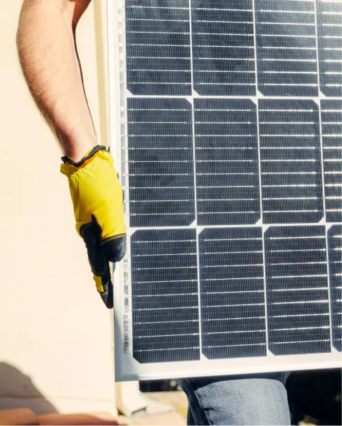 a man wearing a yellow glove