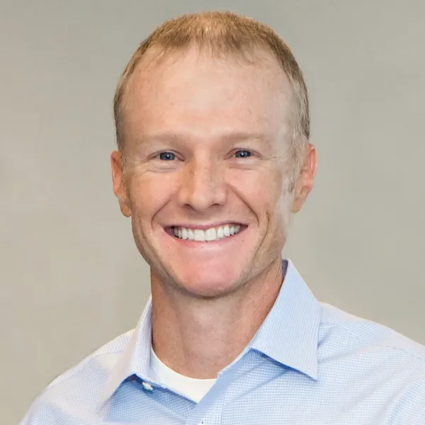 a man smiling for the camera